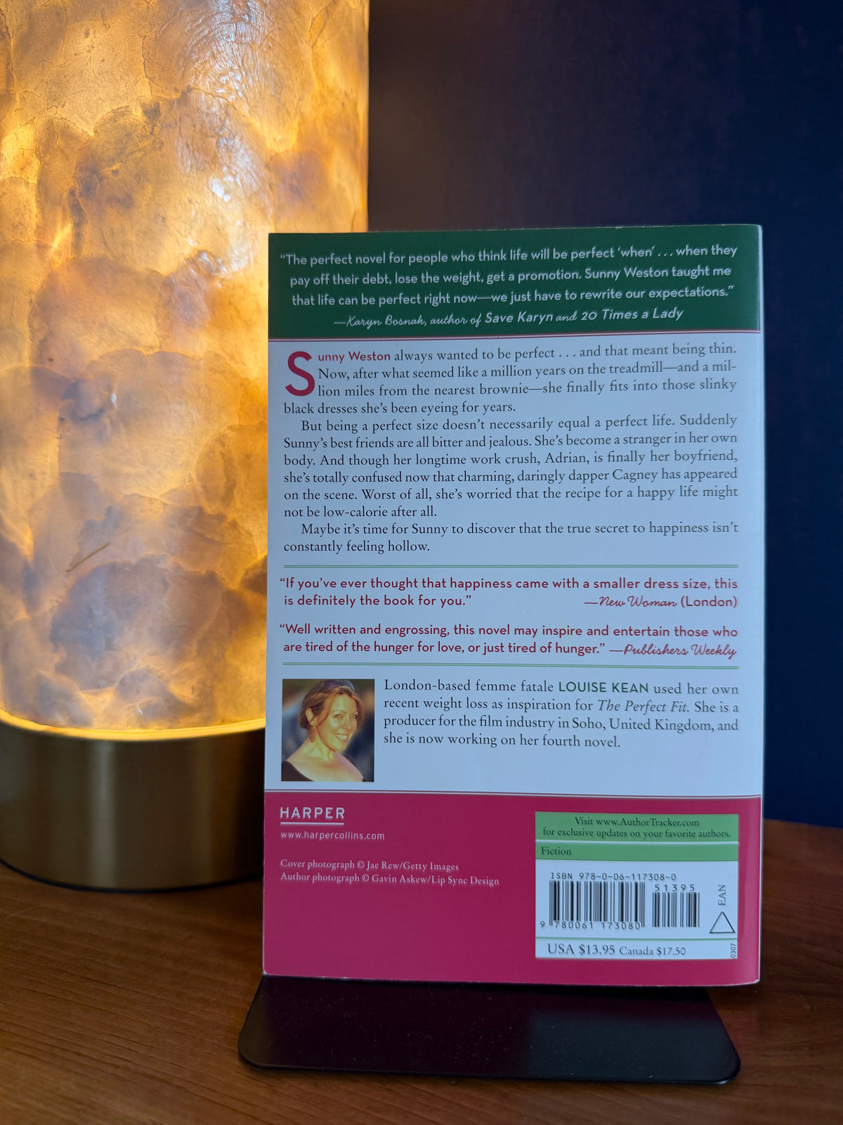 Book back cover with a lamp casting light on it